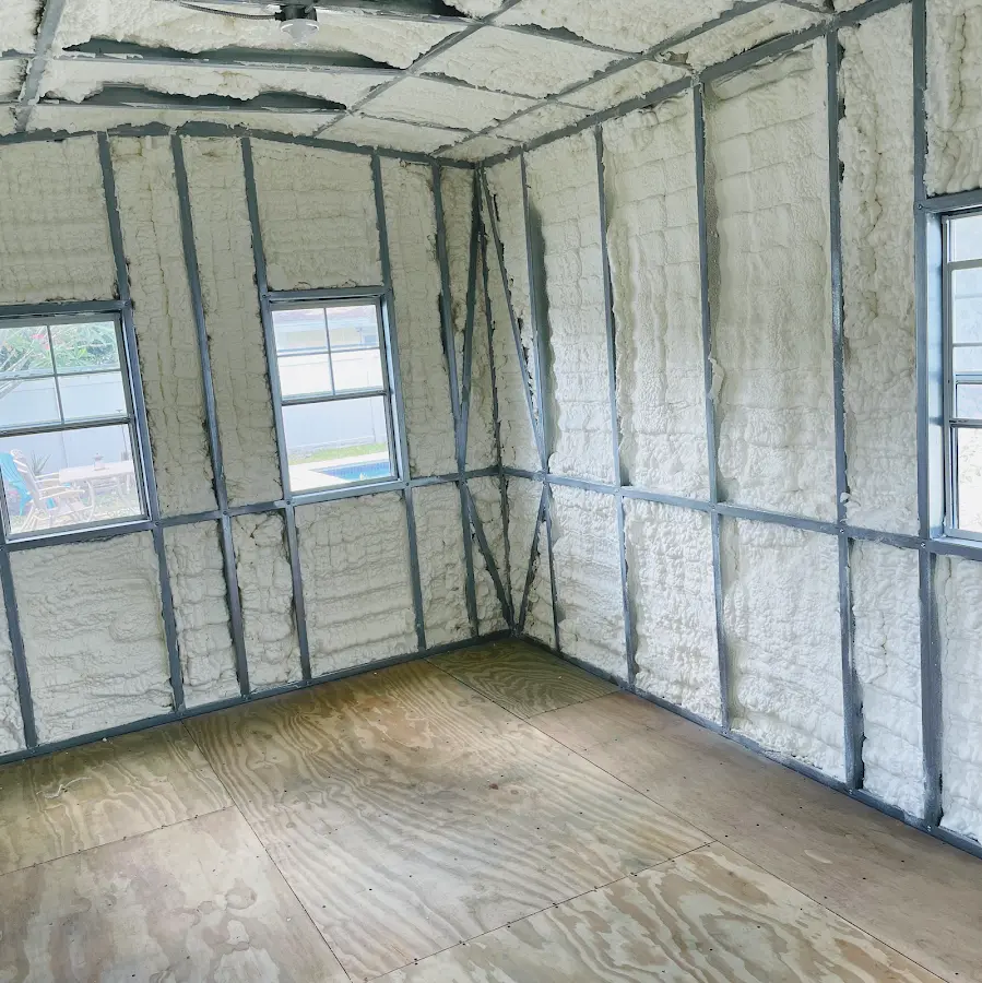 Closed-cell spray foam insulation applied to wall cavities in a residential project in Accokeek